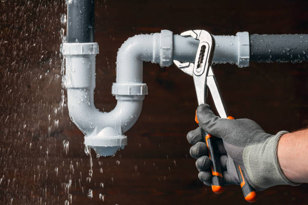 Professional Plumber technician working in Trimble, OH